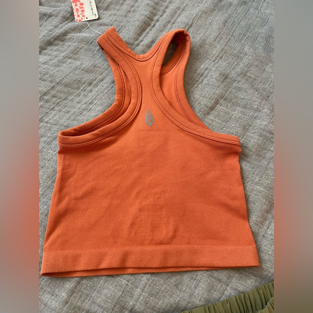 Excellent used condition. Worn once. Free People Trophy Tank